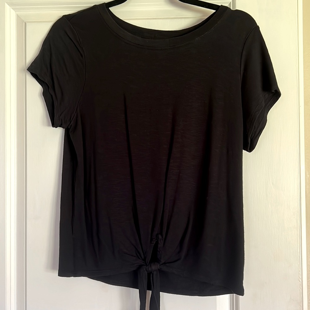 Almost new black athletic top. Tie front detail.